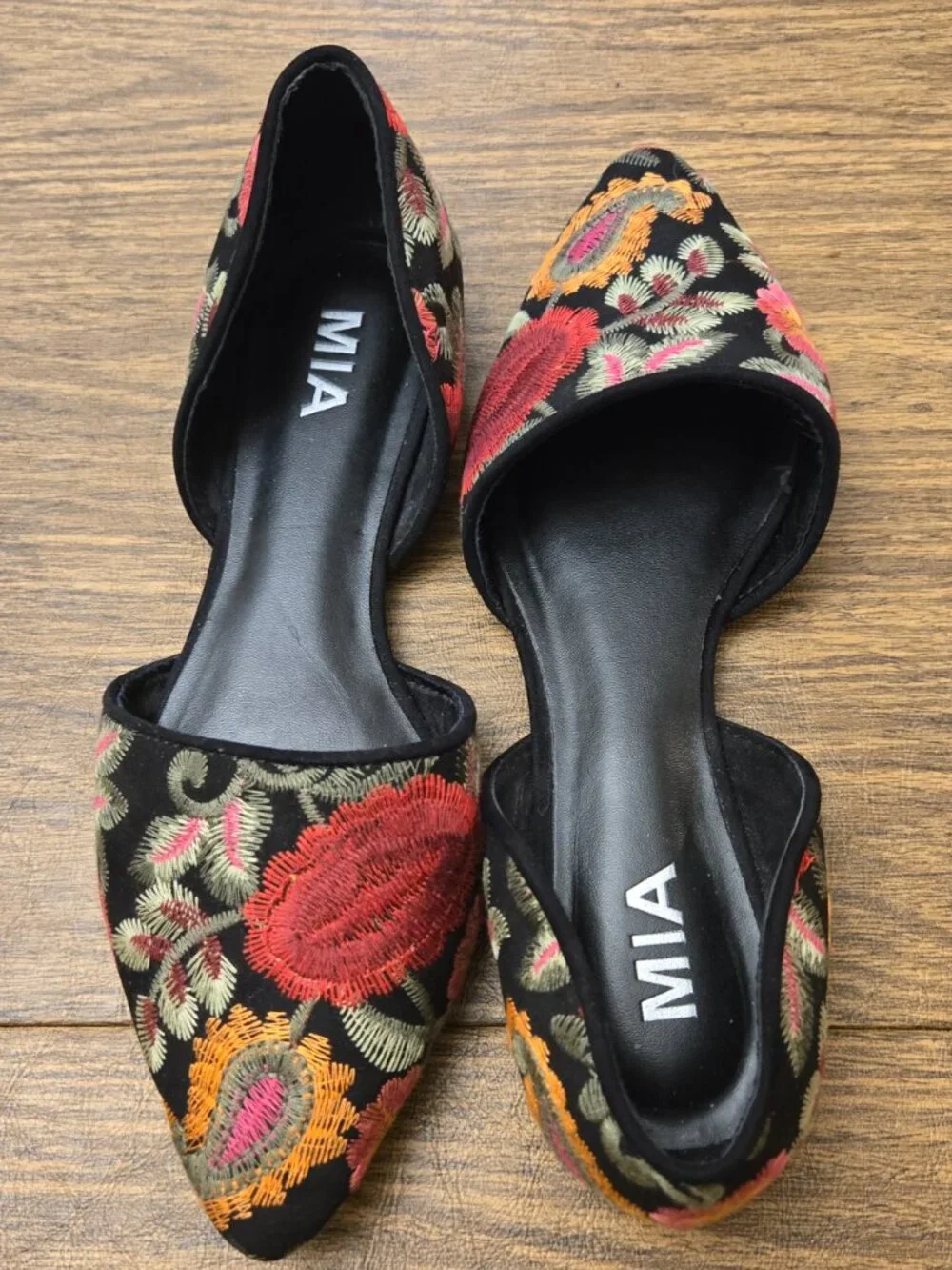 MIA Caroline Floral Embroidered d'Orsay Pointed Toe Flats on Black Background